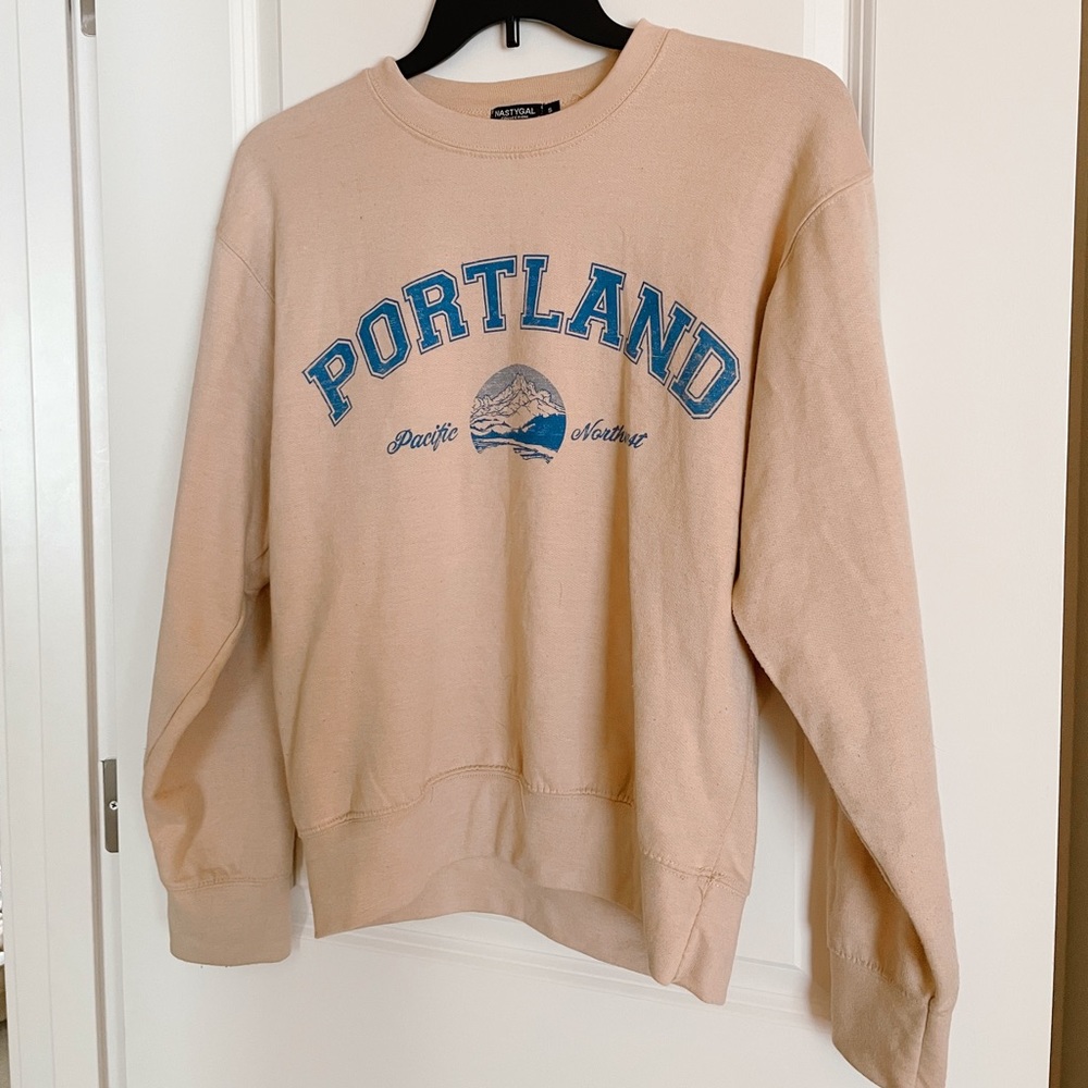 Nastygal “Portland: Pacific Northwest” tan and blue crewneck sweatshirt